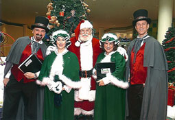 Caroling Company costumed victorian singers with Santa at Rosedale Center Mall, Minnesota
